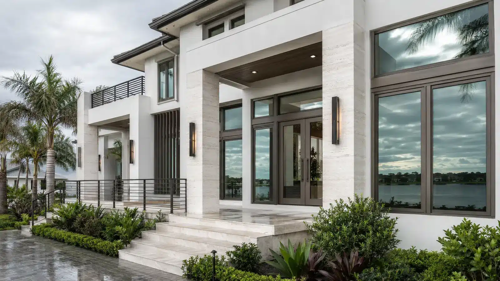 Florida coastal luxury home exterior with impact windows and doors